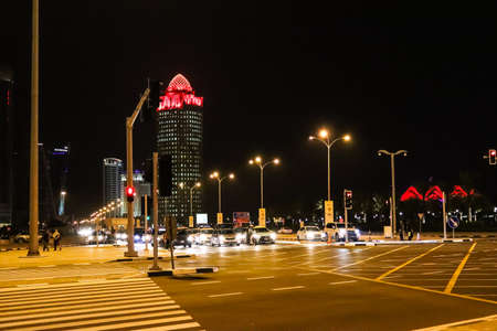 Doha, Qatar - October 26, 2018: A part of a Doha city with modern architecture and traffic at...