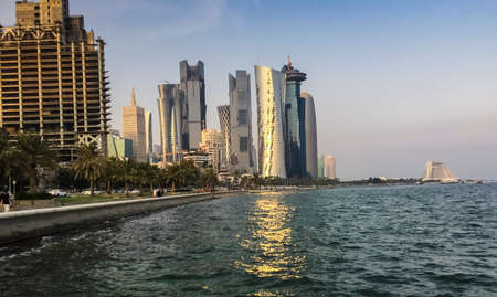 Beautiful view of amazing skyscrapers during evening in Corniche city, Qatar.のeditorial素材