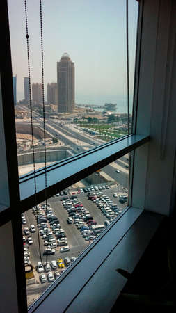 Outside view of a busy city from the office window.のeditorial素材