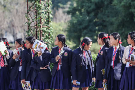 Happy school children posing for camera during their field-visit. School students on their educational tour.のeditorial素材