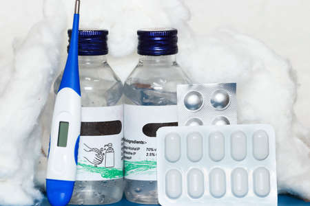 Close-up view of medical kit highly used during COVID-19. Medical kit to fight against corona-virus includes thermometer, paracetamol, sanitizer and anti-cold tabletsのeditorial素材