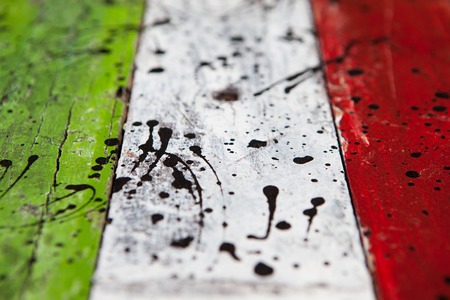 Patterned and textures background of brightly colored panels of weathered painted wooden boardsの写真素材