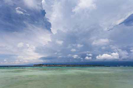 Seascape the big clouds in the background the Islands of Nusa Penida, Indonesiaの写真素材