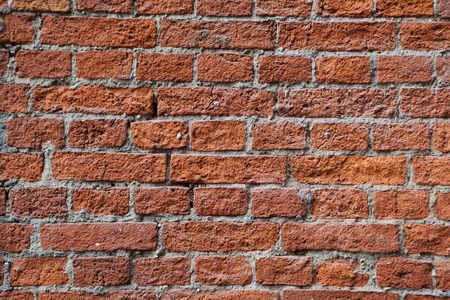 red brick wall texture grunge background with vignetted corners to interior design