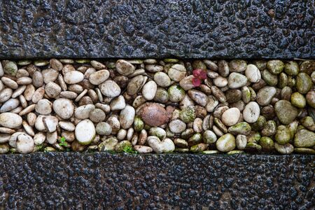 Pavement of round stones backgroundの写真素材