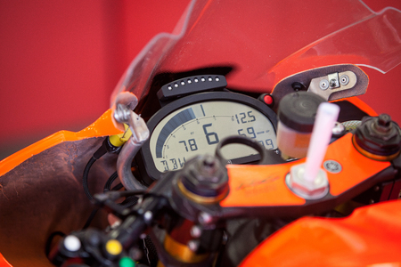 The dashboard with the speedometer on the instrument panel of the motorcycle closeupの写真素材