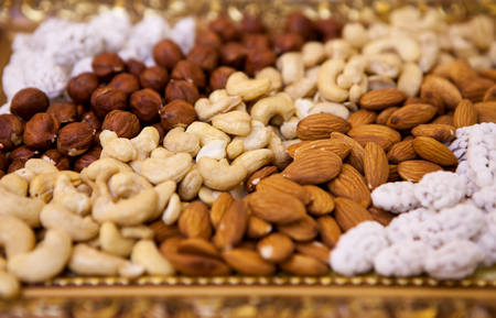 Natural background made from different kinds of nutsの写真素材
