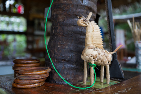 Hand made horse toy made of straw bar counter decoration in tropical styleの写真素材