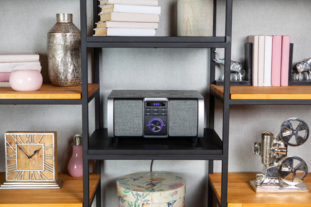 Compact CD radio player on the shelf in the vintage interior of the living roomの写真素材