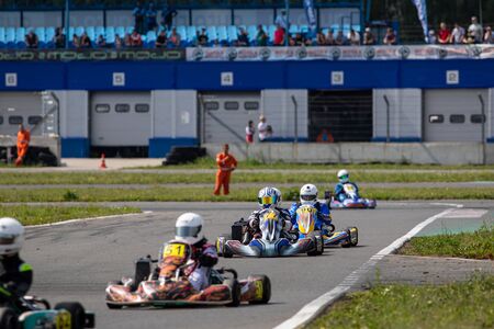 Unidentified pilots compete on the Atron track in the Rotax max Cup RAF series of sports karting, track raceのeditorial素材