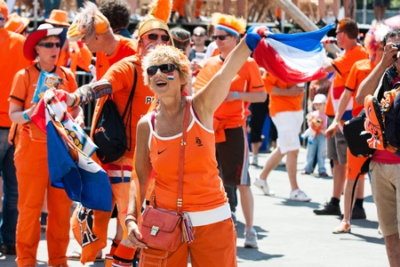 KHARKIV, UKRAINE - JUNE 08  Football fans during footbal match at fan-zone during football match Netherlands vs Denmark, June 08, 2012 in Kharkov, Ukraineのeditorial素材
