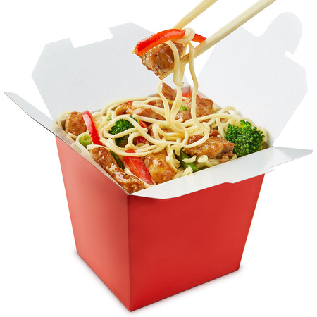 Wok noodles box with chopsticks  isolated on white backgroundの写真素材