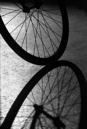 Bike Wheel -- an interesting display of shadow and lightの写真素材