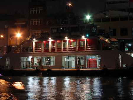 River Ferry by Night -- docked along the pierの写真素材