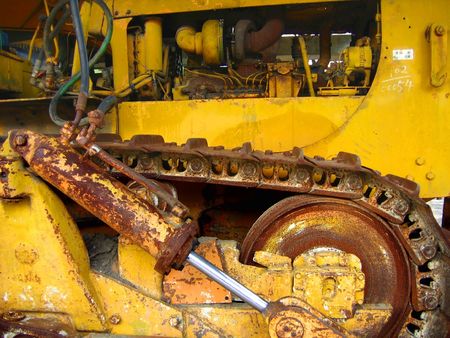 Old Bulldozer -- with rusty tracks and hydraulic partsの写真素材