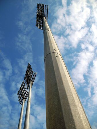 Baseball Stadium Lighting -high-powered floodlights seen against a pretty skyの写真素材