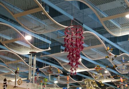 Modern Ceiling -- with various mobile constructed from different materialsの写真素材