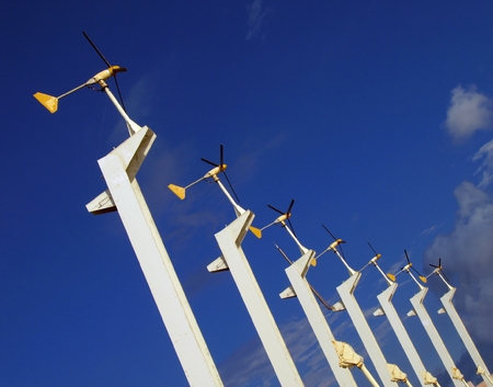 Wind Mill Turbines -- with generators; seen against a beautiful summer skyの写真素材
