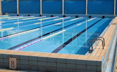 A pool designed for swimming competitions with lane separators