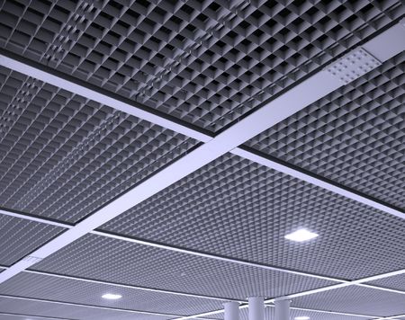 A modern interior ceiling structure composed of square elementsの写真素材