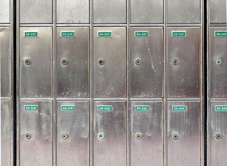 Rows and columns of old mail boxes