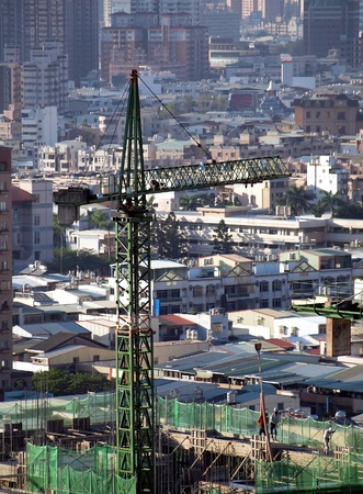 Construction site with a crane seen from aboveの写真素材