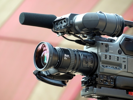 QIAOTOU, TAIWAN -- NOVEMBER 24, 2013: A professional Sony video camera is used to film a public...