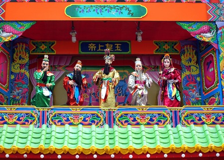 KAOHSIUNG, TAIWAN -- FEBRUARY 8, 2014: Puppets in traditional costumes are displayed at a temple in honor of the Jade Emperor's birthday, which falls on the 9th day of the Chinese New Year.のeditorial素材