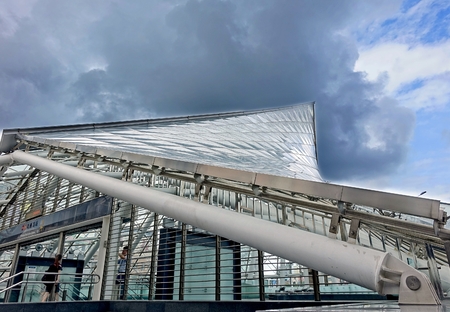 KAOHSIUNG, TAIWAN -- JUNE 26, 2014: The entrance to the Formosa Boulevard Station of the Kaohsiung City subway transportation system sports a modern design with curved lines.のeditorial素材
