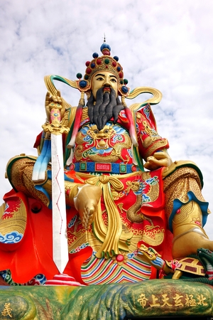 KAOHSIUNG, TAIWAN -- MAY 25, 2014: This giant statue of a Taoist god is believed to guard the Lotus Lake in Kaohsiung, Taiwan.のeditorial素材