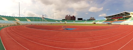KAOHSIUNG, TAIWAN -- JULY 1, 2014: A view of the athletic running tracks and the bleachers of the Jhong Jheng Stadium in Kaohsiung city.のeditorial素材