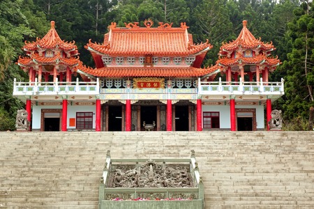 KAOHSIUNG, TAIWAN -- JANUARY 30, 2015:  The traditional Gong De Temple in the foothills of Liu-Yi Mountain is surrounded by dense forests.のeditorial素材