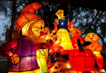 KAOHSIUNG, TAIWAN -- MARCH 6, 2015: Colorful lanterns to celebrate the Chinese year of the goat are on display along the banks of the Love River during the traditional Lantern Festival. Here pictured is Snowhite and the 7 Dwarfsのeditorial素材