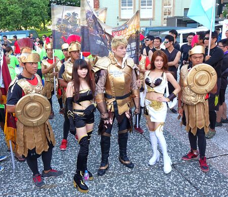 KAOHSIUNG, TAIWAN -- JUNE 17, 2015: Actors dressed up in fantasy costumes promote the mobile app strategy game Clash of Kings at a public event.のeditorial素材