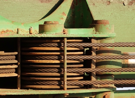 Steel cables and rollers of a piece of construction equipmentの写真素材