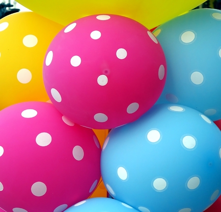 Colorful Balloons in bright colors create a happy atmosphereの写真素材