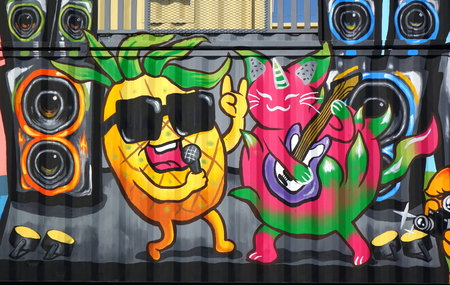 PINGTUNG, TAIWAN -- FEBRUARY 14, 2018: Shipping containers painted with colorful graffiti images form the entrance to the Pingtung Tropical Agricultural Fair.のeditorial素材