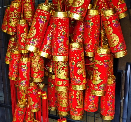 KAOHSIUNG, TAIWAN -- FEBRUARY 16, 2018: An outdoor stall sells colorful decorations for the Chinese New Year. Firecrackers are a symbol for good luck and prosperity.のeditorial素材