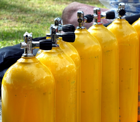 KAOHSIUNG, TAIWAN -- JUNE 30, 2018: Steel bottles with compressed air are prepared to inflate rubber boats at the 2018 Love River Festival.のeditorial素材