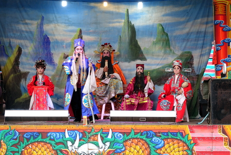 KAOHSIUNG, TAIWAN -- OCTOBER 26, 2018: Taiwan folk opera is performed in an outdoor public space as part of a temple celebration.のeditorial素材