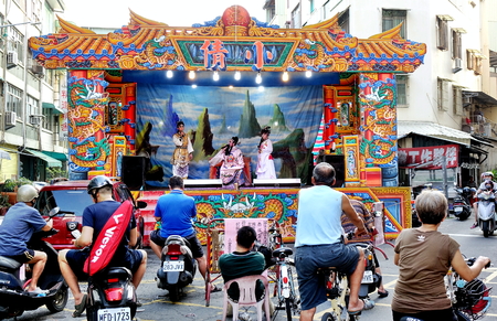 KAOHSIUNG, TAIWAN -- OCTOBER 26, 2018: Taiwan folk opera is performed in an outdoor public space as part of a temple celebration.のeditorial素材