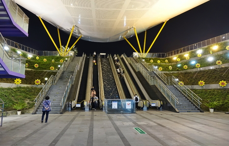 KAOHSIUNG, TAIWAN -- DECEMBER 1, 2018: The exit and entry of the modern Central Park Station of the Kaohsiung Mass Rapid Transit system.のeditorial素材