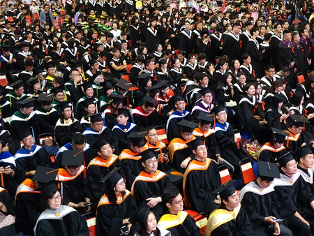 TAINAN, TAIWAN -- JUNE 2, 2018: Graduates listen to a speech at the annual graduation ceremony of NCKU university.のeditorial素材