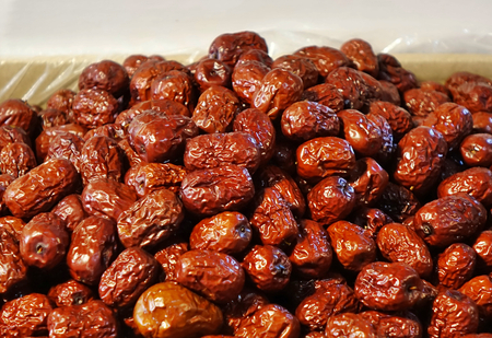 Dried Jujube fruits for sale at an outdoor marketの写真素材