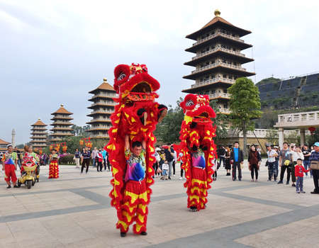 KAOHSIUNG, TAIWAN -- JANUARY 25, 2020: Traditional Chinese Lion dancers perform at the Fo Guang Shan Buddhist complex during Chinese New Year.のeditorial素材