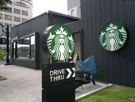 KAOHSIUNG, TAIWAN -- MARCH 3, 2020: A branch of the popular coffee shop chain Starbucks in the southern port city of Kaohsiung.のeditorial素材
