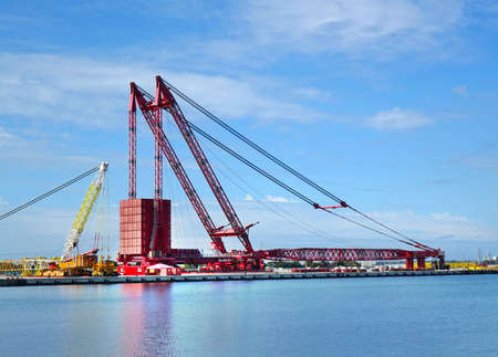 KAOHSIUNG, TAIWAN -- MARCH 15, 2019: A large container facility is being constructed at the Xinda fishing port.のeditorial素材