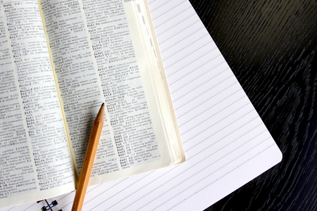 Dictionary and notebook and pencilの写真素材