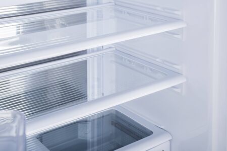 New Refrigerator Isolated on White Background. Modern Kitchen and Domestic Major Appliancesの写真素材