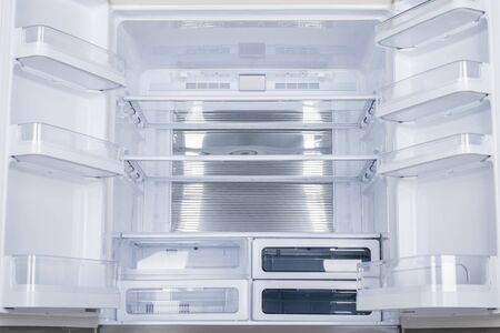 New Refrigerator Isolated on White Background. Modern Kitchen and Domestic Major Appliancesの写真素材